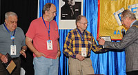 Phil presents awards to Tom Craven, Tony Dunn and Robert K. Miller